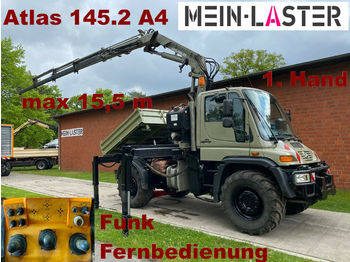 Vehículo municipal, Camión volquete Unimog U 400 Seilwinde Atlas 145.2 A4 15.5 m Funk FB: foto 1