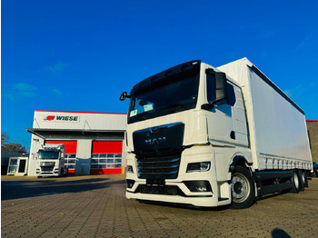 Camión lona MAN TGX 26.440