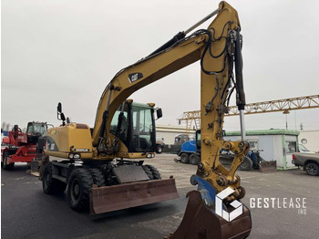 Excavadora de ruedas Caterpillar M313D Mono: foto 4