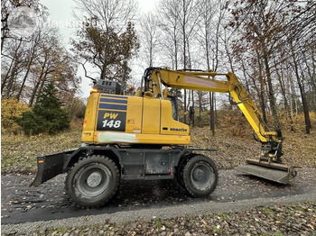 Excavadora de ruedas Komatsu PW 148-11 med vagn och redskap: foto 5