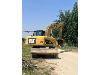 Excavadora de ruedas CATERPILLAR M317: foto 2