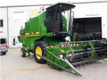Cosechadora de granos John Deere 1158: foto 1
