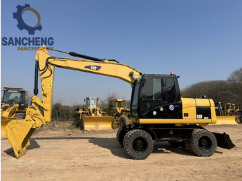 Excavadora de ruedas CATERPILLAR M320