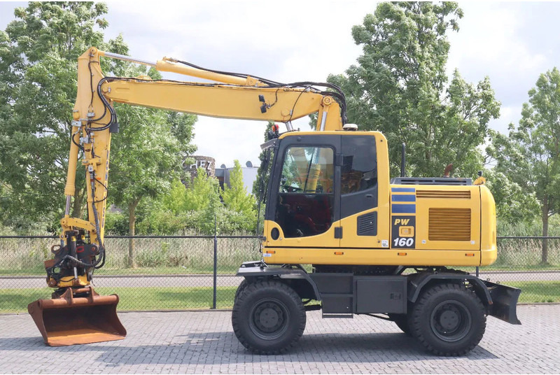 Komatsu PW 160-10 | ROTOTILT | NEW TIRES - Excavadora de ruedas: foto 1 Komatsu PW 160-10 | ROTOTILT | NEW TIRES - Excavadora de ruedas: foto 1