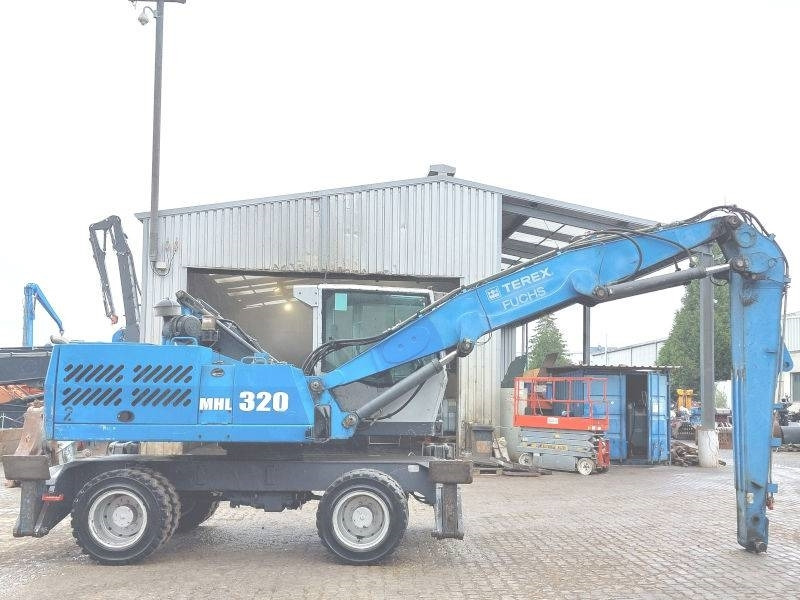 Fuchs MHL 320 D  - Manipulador de materiales: foto 5 Fuchs MHL 320 D  - Manipulador de materiales: foto 5
