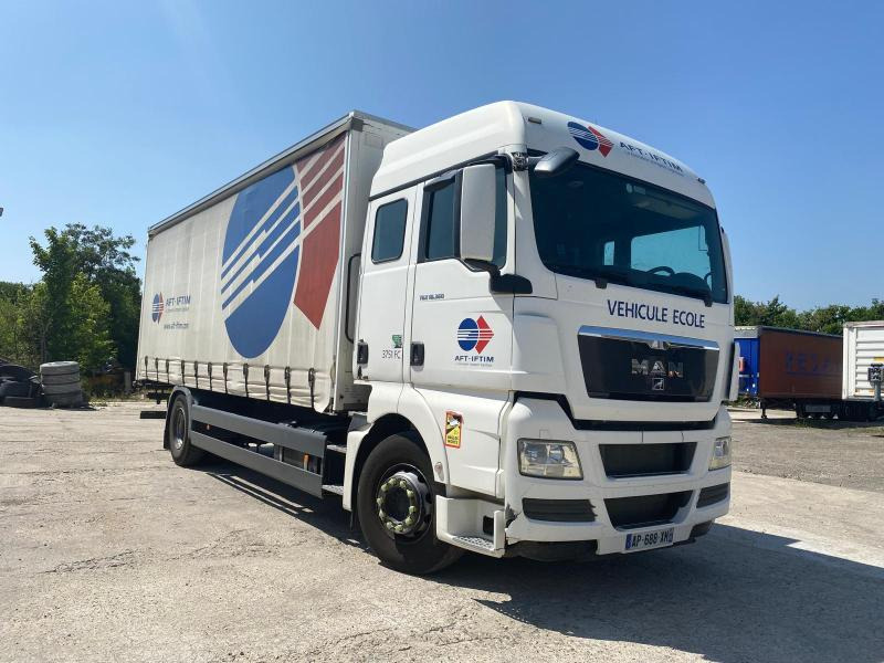 MAN TGX 18.360 - Camión lona: foto 1 MAN TGX 18.360 - Camión lona: foto 1