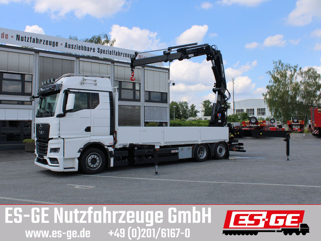 MAN TGX 26.480 6x2-4 LL CH mit MKG HLK531 a5 - Camión caja abierta, Camión grúa: foto 1 MAN TGX 26.480 6x2-4 LL CH mit MKG HLK531 a5 - Camión caja abierta, Camión grúa: foto 1