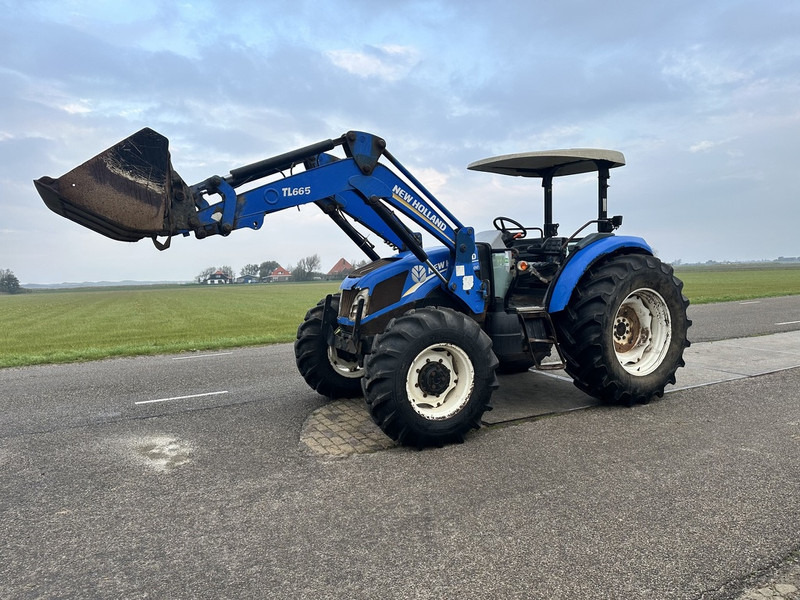 New Holland TD5.100 - Tractor: foto 1 New Holland TD5.100 - Tractor: foto 1