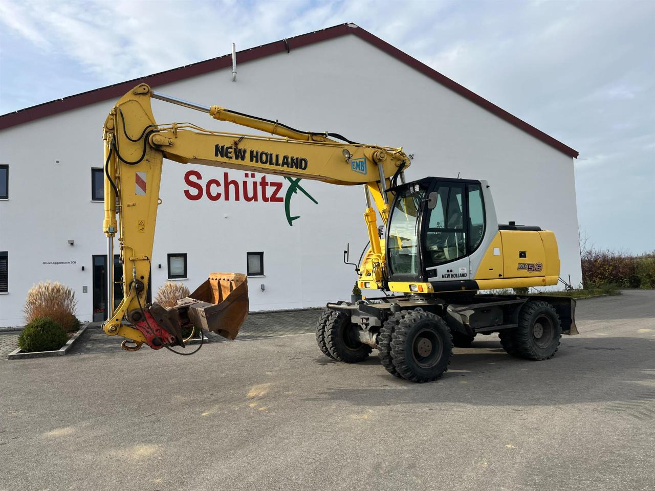 New Holland MH 5.6 inkl. Grabenlöffel, Tieflöffel - Excavadora de ruedas: foto 2 New Holland MH 5.6 inkl. Grabenlöffel, Tieflöffel - Excavadora de ruedas: foto 2