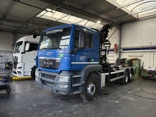 MAN TGS 26.320 6x2 Abrollkipper + Kran HIAB 166 E-5 - Camión multibasculante, Camión grúa: foto 1 MAN TGS 26.320 6x2 Abrollkipper + Kran HIAB 166 E-5 - Camión multibasculante, Camión grúa: foto 1