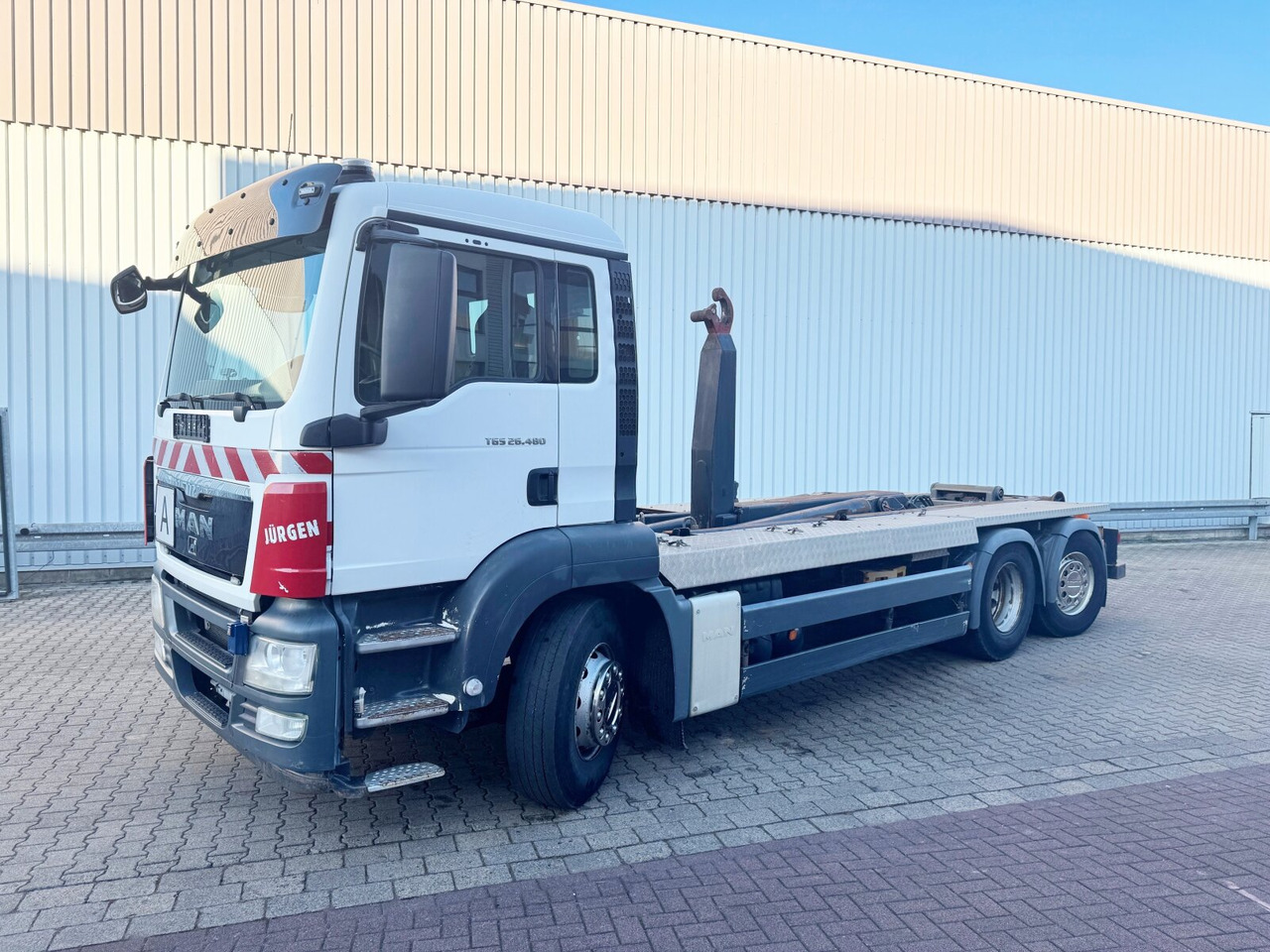 MAN TGS 26.480 6x2-4 BL TGS 26.480 6x2-4 BL, Lenk-Liftachse, VDL Abrollkipper bis 7m Container - Camión multibasculante: foto 1 MAN TGS 26.480 6x2-4 BL TGS 26.480 6x2-4 BL, Lenk-Liftachse, VDL Abrollkipper bis 7m Container - Camión multibasculante: foto 1