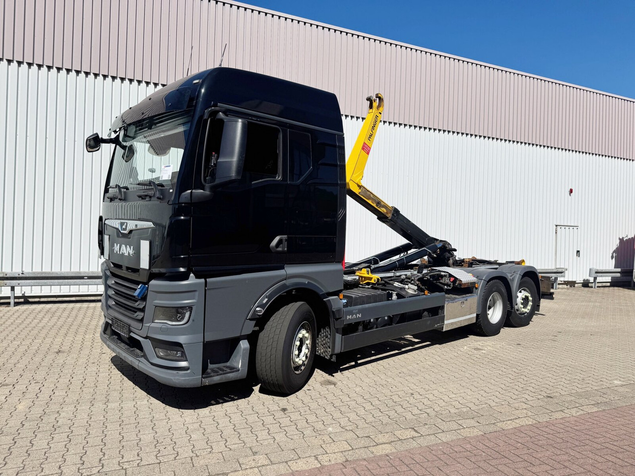 MAN TGX 26.510 6X2-4 BL TGX 26.510 6X2-4 BL, Lenk-/Liftachse, Funk - Camión multibasculante: foto 1 MAN TGX 26.510 6X2-4 BL TGX 26.510 6X2-4 BL, Lenk-/Liftachse, Funk - Camión multibasculante: foto 1