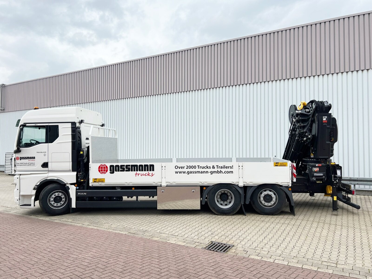 MAN TGX 26.510 6x2-4 LL CH TGX 26.510 6x2-4 LL, Kran Hiab X-HiPro 548 E-8, Lenk-/Liftachse, TwistLock 20Fuß, Funk, Retarder - Camión grúa, Camión caja abierta: foto 2 MAN TGX 26.510 6x2-4 LL CH TGX 26.510 6x2-4 LL, Kran Hiab X-HiPro 548 E-8, Lenk-/Liftachse, TwistLock 20Fuß, Funk, Retarder - Camión grúa, Camión caja abierta: foto 2