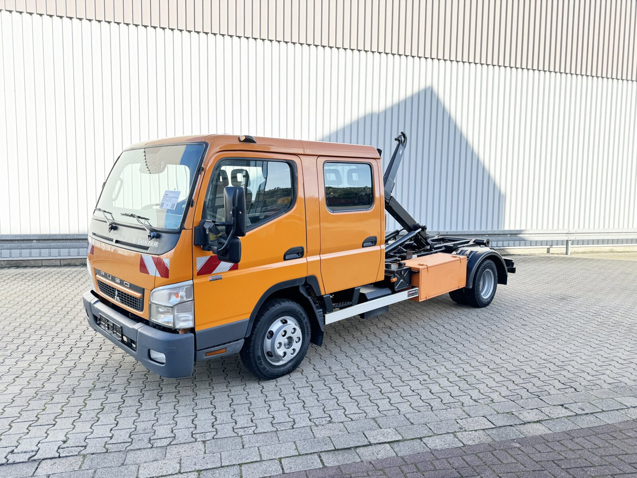 Mitsubishi Canter Fuso 6C15D 4x2 Doka Canter Fuso 6C15D 4x2 Doka, City-Abroller - Camión multibasculante: foto 1 Mitsubishi Canter Fuso 6C15D 4x2 Doka Canter Fuso 6C15D 4x2 Doka, City-Abroller - Camión multibasculante: foto 1