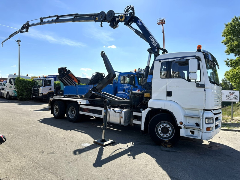 MAN TGA 26.310 6X2 HOOKLIFT + CRANE COPMA 160.4 + JIB J2 + WINCH - RADIO - LIFT + STEERING AXLE - EURO 3 - BE - Camión multibasculante, Camión grúa: foto 1 MAN TGA 26.310 6X2 HOOKLIFT + CRANE COPMA 160.4 + JIB J2 + WINCH - RADIO - LIFT + STEERING AXLE - EURO 3 - BE - Camión multibasculante, Camión grúa: foto 1
