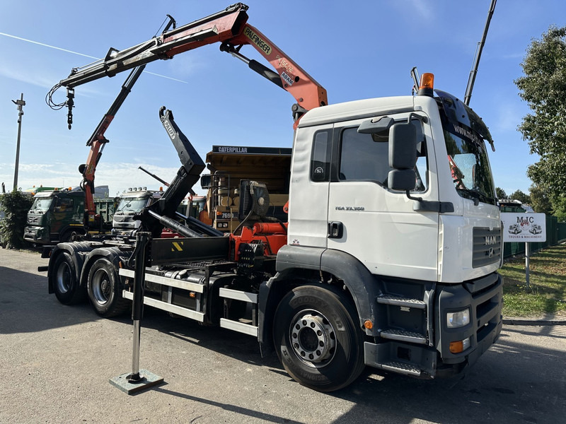 MAN TGA 33.360 6x4 HAAKSYSTEEM + KRAAN PALFINGER PK 15002 - MANUEEL - BLADVERIGN - NAAFREDUCTIE - BE TRUCK - Camión multibasculante, Camión grúa: foto 1 MAN TGA 33.360 6x4 HAAKSYSTEEM + KRAAN PALFINGER PK 15002 - MANUEEL - BLADVERIGN - NAAFREDUCTIE - BE TRUCK - Camión multibasculante, Camión grúa: foto 1