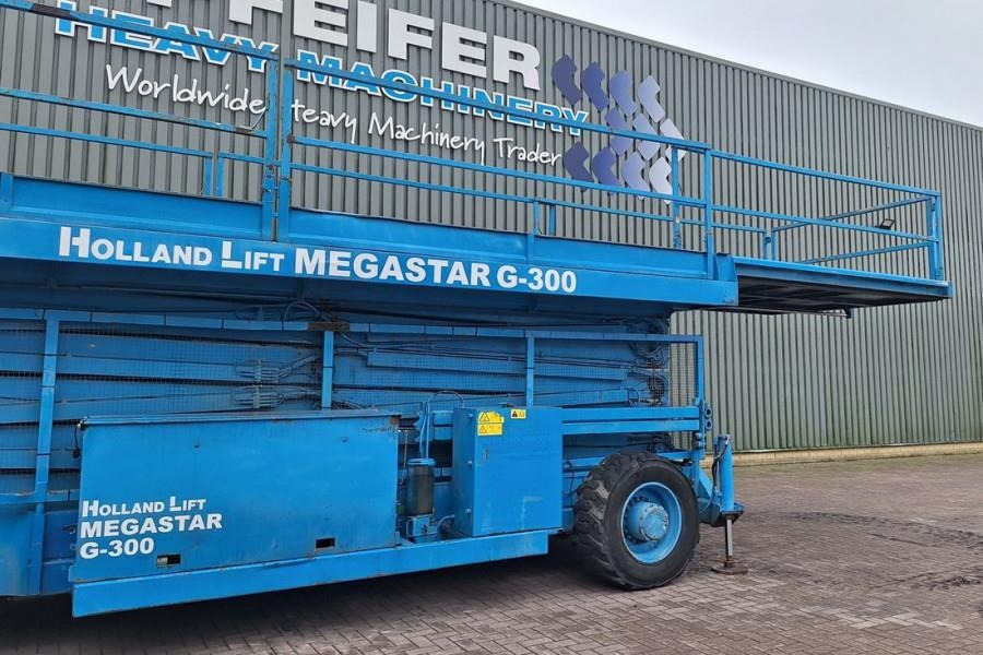 Plataforma de tijeras Holland Lift Megastar G300 Diesel, 4x4x4 Drive, 33.5m Working H: foto 9