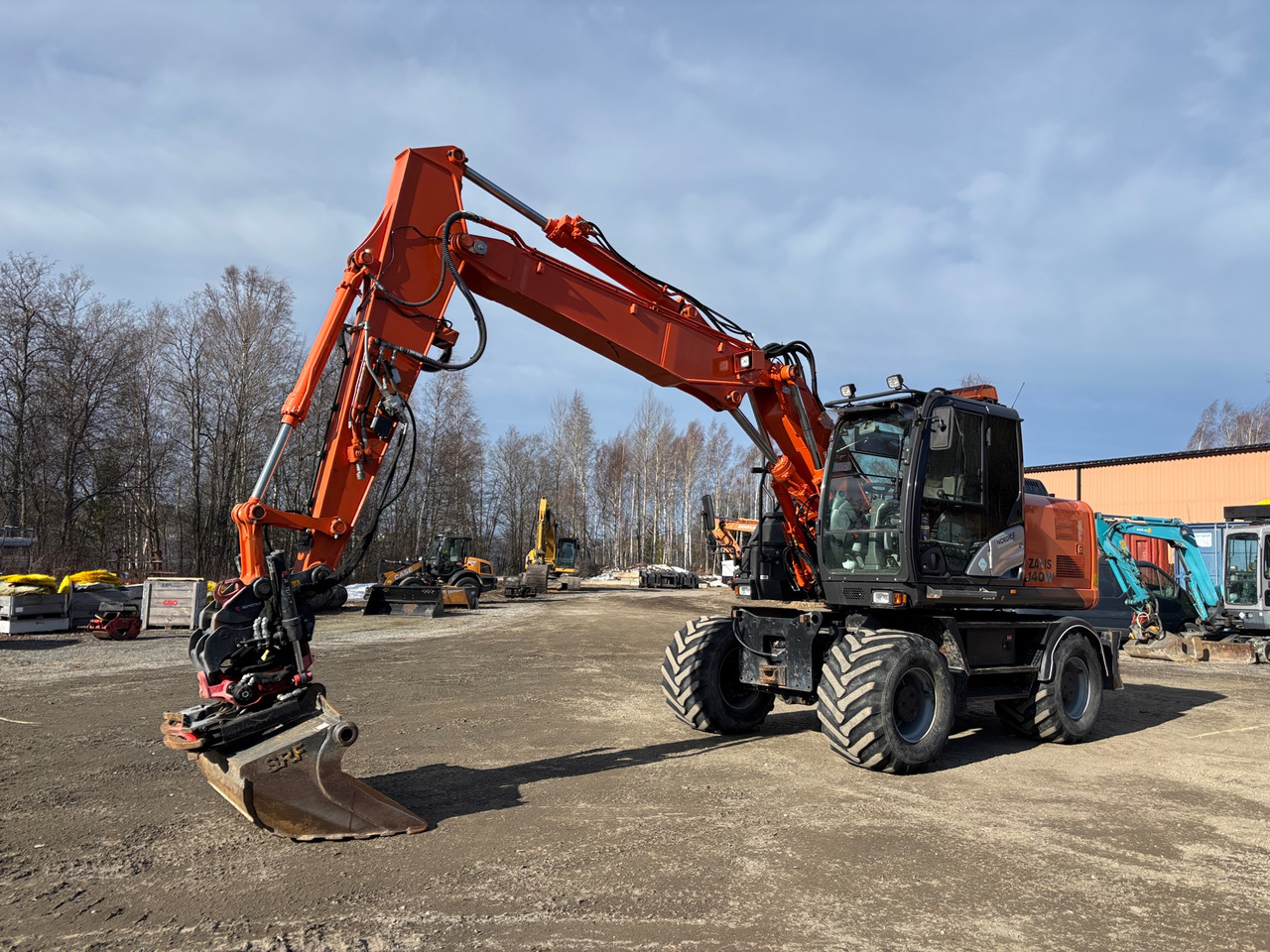 Hitachi ZX140W-5B - Excavadora: foto 1 Hitachi ZX140W-5B - Excavadora: foto 1