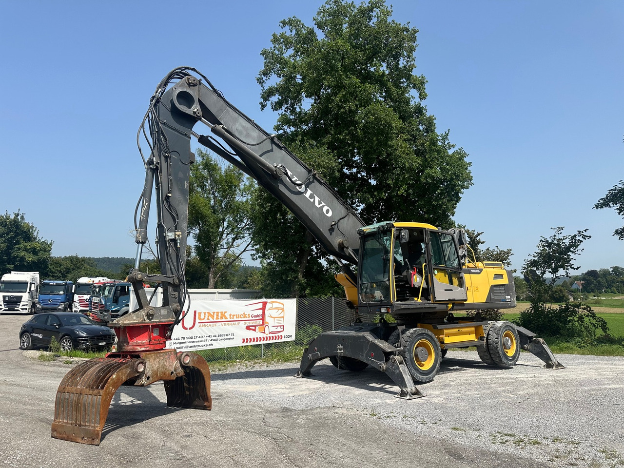 VOLVO EW 210 D 24t Greifer - Excavadora: foto 1 VOLVO EW 210 D 24t Greifer - Excavadora: foto 1
