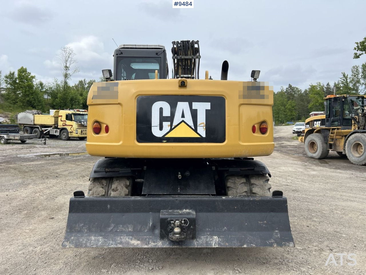 Excavadora de ruedas CAT M313D with tipping wagon and attachments (VIDEO): foto 9