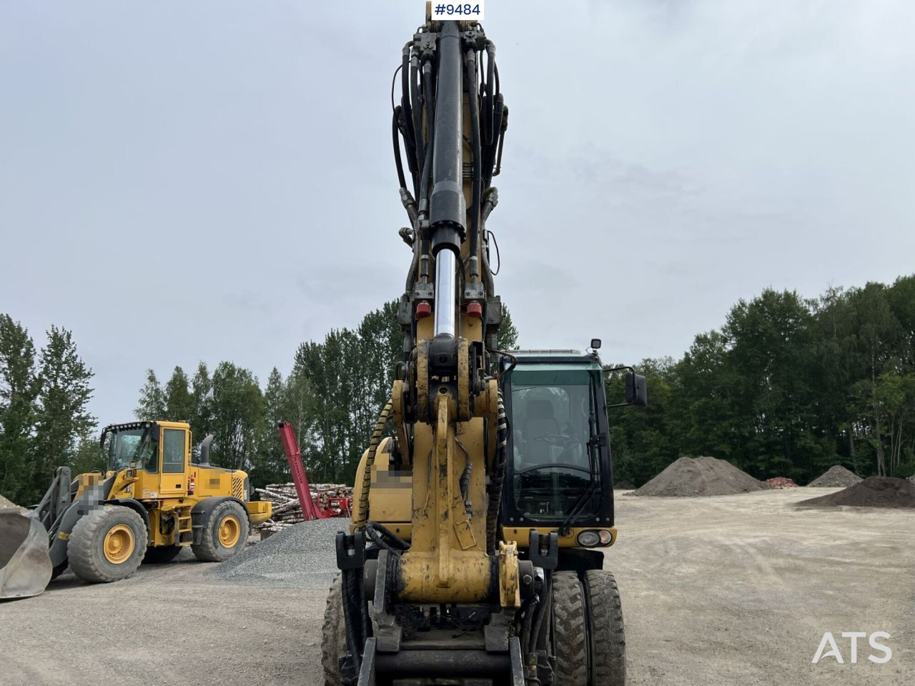 Excavadora de ruedas CAT M313D with tipping wagon and attachments (VIDEO): foto 19