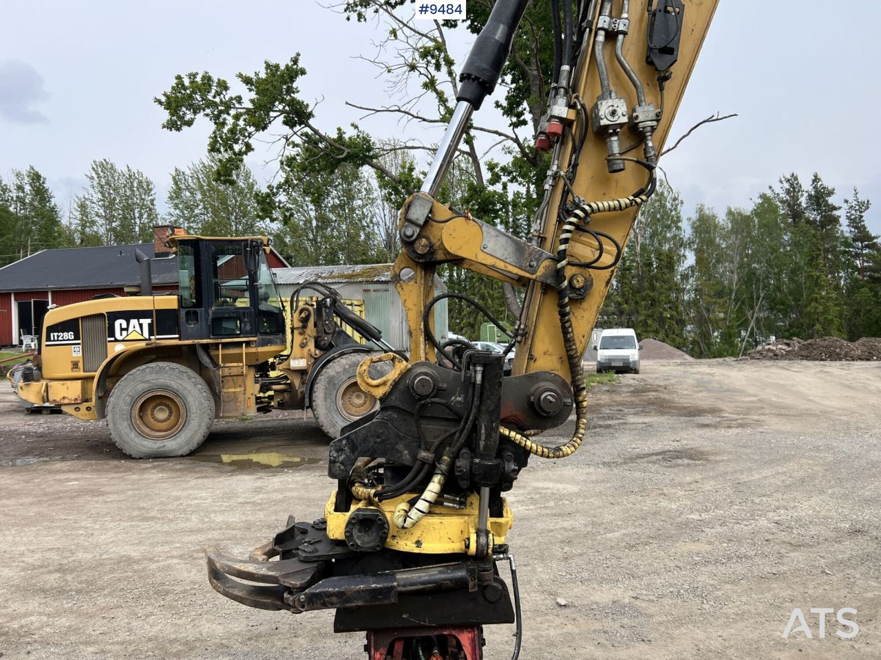 Excavadora de ruedas CAT M313D with tipping wagon and attachments (VIDEO): foto 20