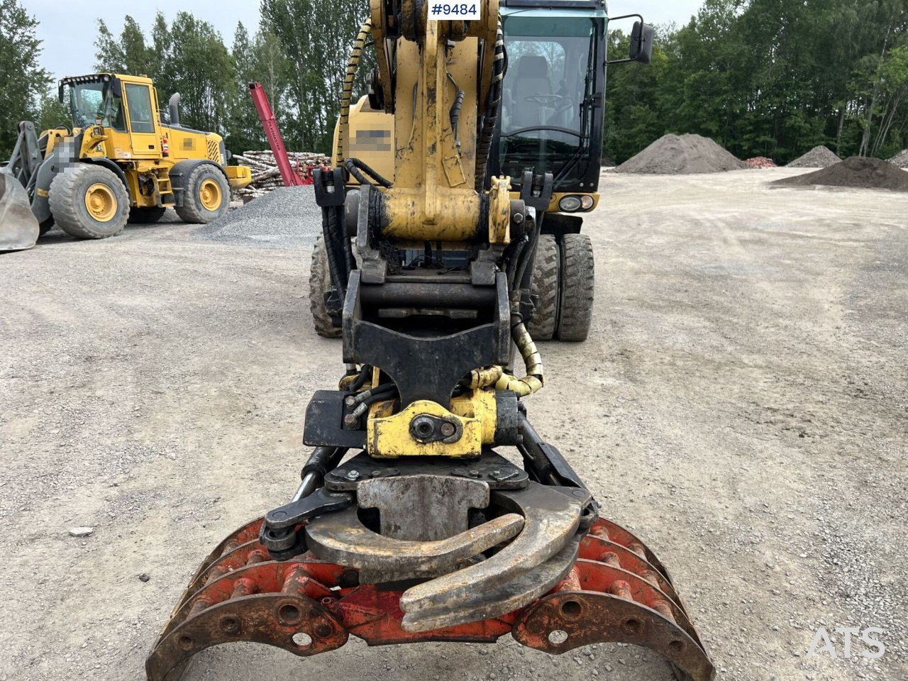 Excavadora de ruedas CAT M313D with tipping wagon and attachments (VIDEO): foto 18