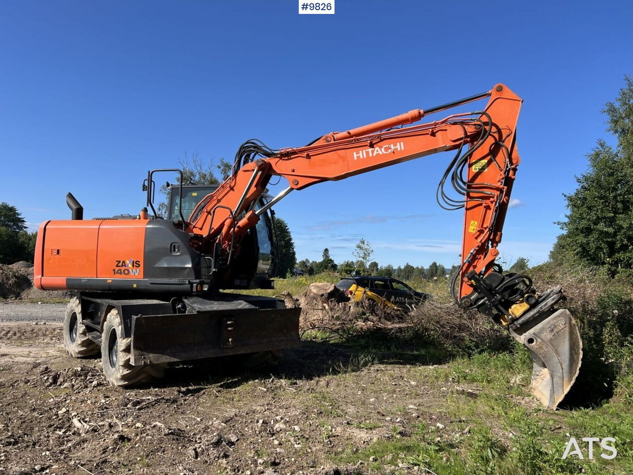 Hitachi ZX140 W-5B with rotor and planer bucket - Excavadora de ruedas: foto 1 Hitachi ZX140 W-5B with rotor and planer bucket - Excavadora de ruedas: foto 1