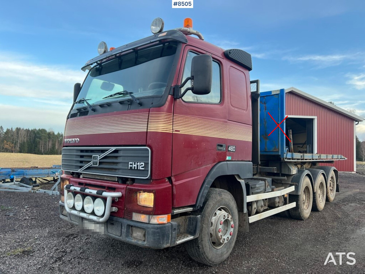 Hook Truck Volvo FH 12 6x4 Tridem with gravel flatbed(VIDEO) - Camión multibasculante: foto 1 Hook Truck Volvo FH 12 6x4 Tridem with gravel flatbed(VIDEO) - Camión multibasculante: foto 1