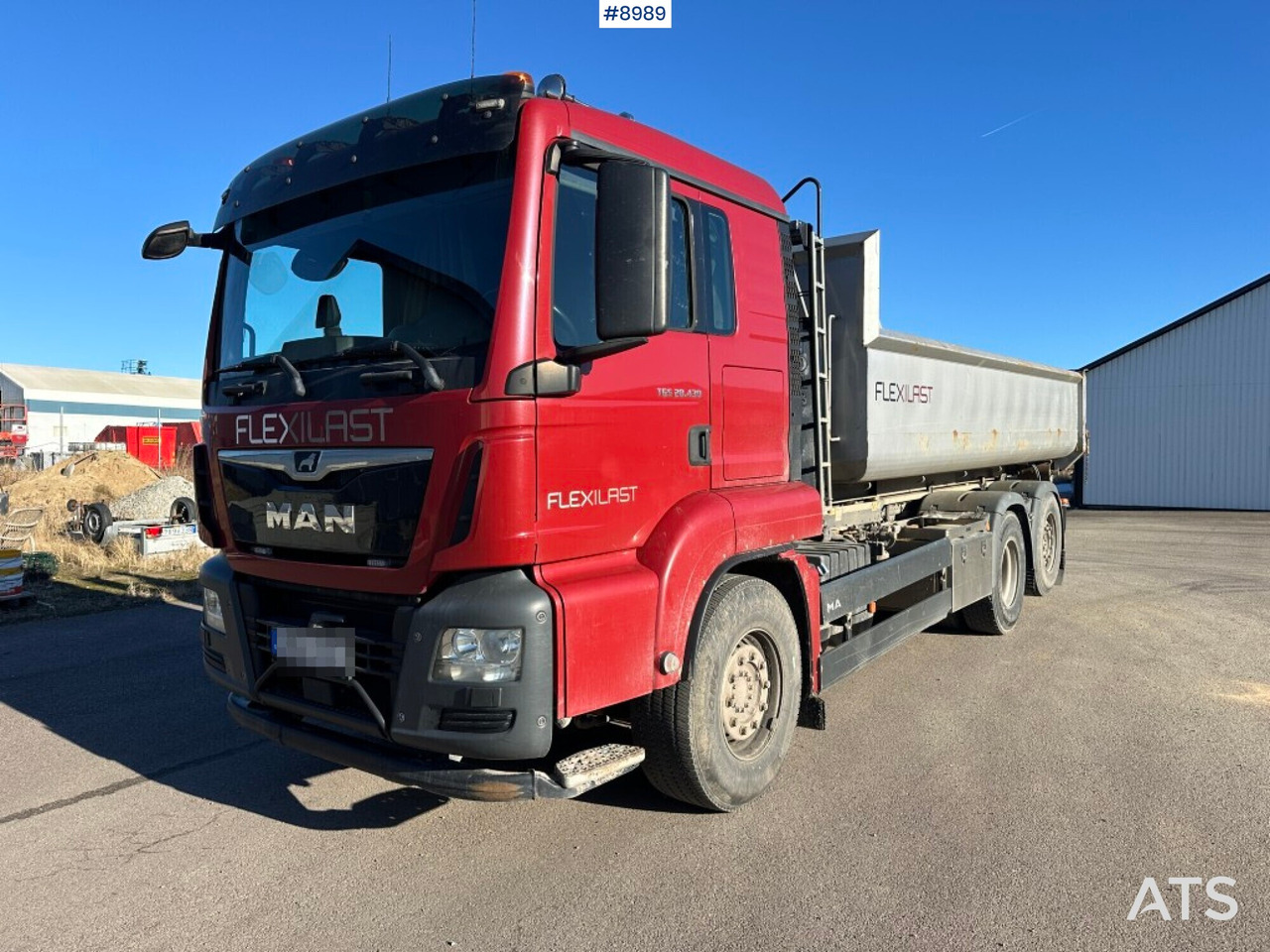 Hook lift MAN TGS 28.430 X2-4 BL with bed - SEE VIDEO - Camión multibasculante: foto 1 Hook lift MAN TGS 28.430 X2-4 BL with bed - SEE VIDEO - Camión multibasculante: foto 1