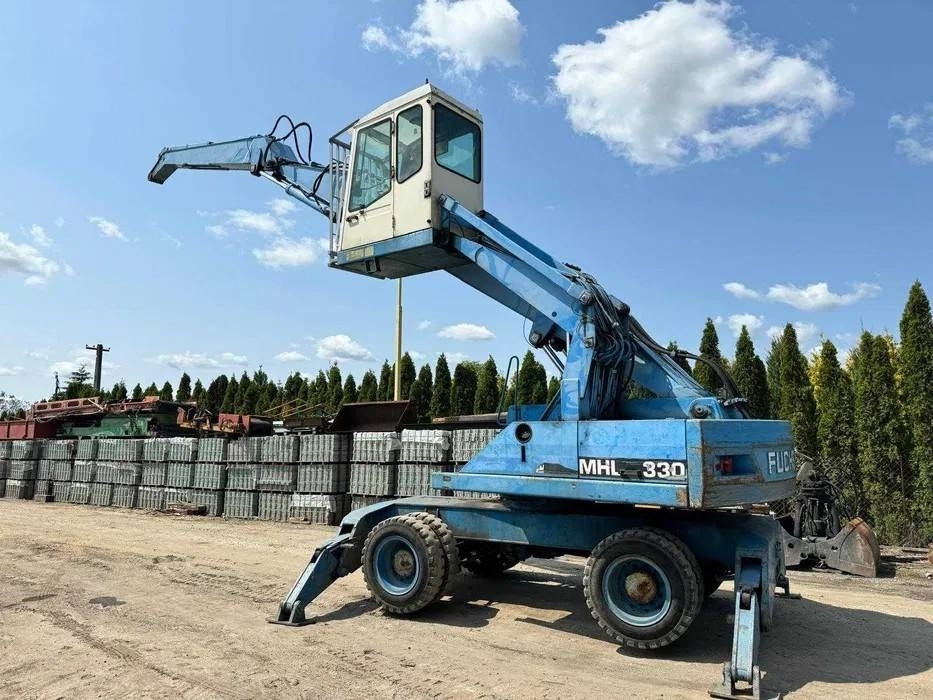Koparka przeładunkowa Fuchs MHL 330 - Manipulador de materiales: foto 2 Koparka przeładunkowa Fuchs MHL 330 - Manipulador de materiales: foto 2