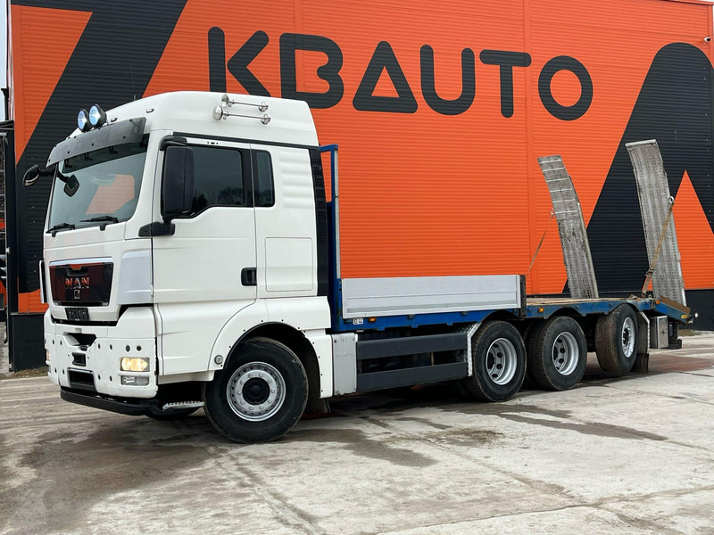 MAN TGX 35.480 8x4*4 PLATFORM L=7400 mm - Camión portavehículos: foto 1 MAN TGX 35.480 8x4*4 PLATFORM L=7400 mm - Camión portavehículos: foto 1