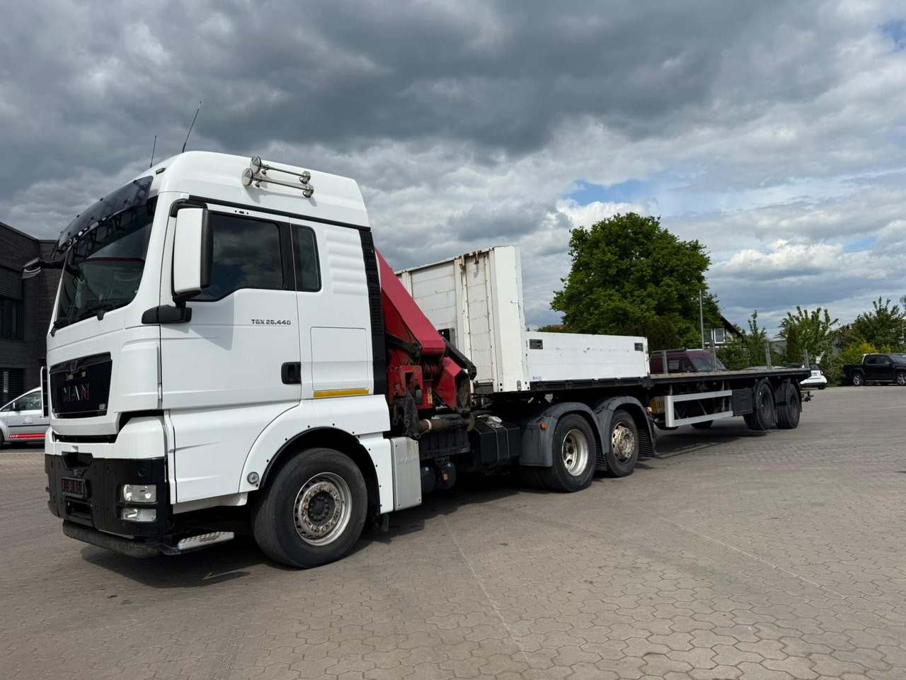 MAN TGX 26.440 6x2 mit HMF 3000-5 Kran - Camión grúa: foto 2 MAN TGX 26.440 6x2 mit HMF 3000-5 Kran - Camión grúa: foto 2