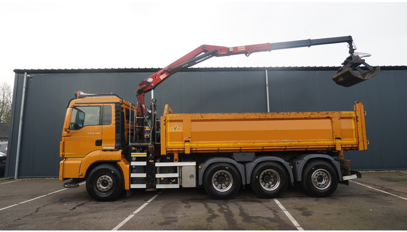 MAN TGS 35-440 8X4 2 SIDE TIPPER WITH HMF Z 1943 CRANE 415.000KM - Camión grúa: foto 2 MAN TGS 35-440 8X4 2 SIDE TIPPER WITH HMF Z 1943 CRANE 415.000KM - Camión grúa: foto 2