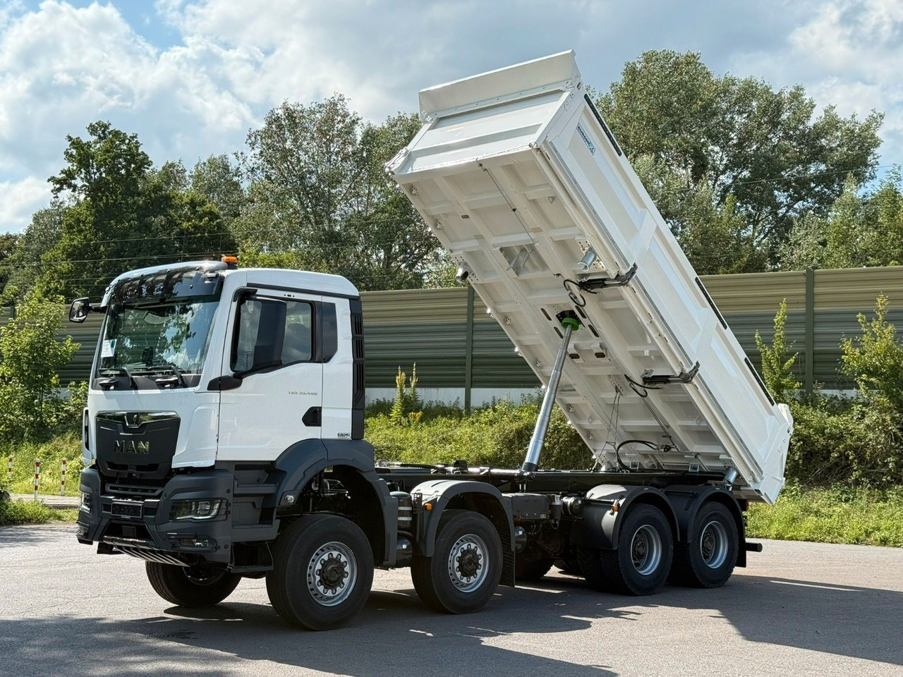 MAN TGS 35.480 8x8 EuromixMTP 3-Seiten-Kipper - Camión volquete: foto 1 MAN TGS 35.480 8x8 EuromixMTP 3-Seiten-Kipper - Camión volquete: foto 1