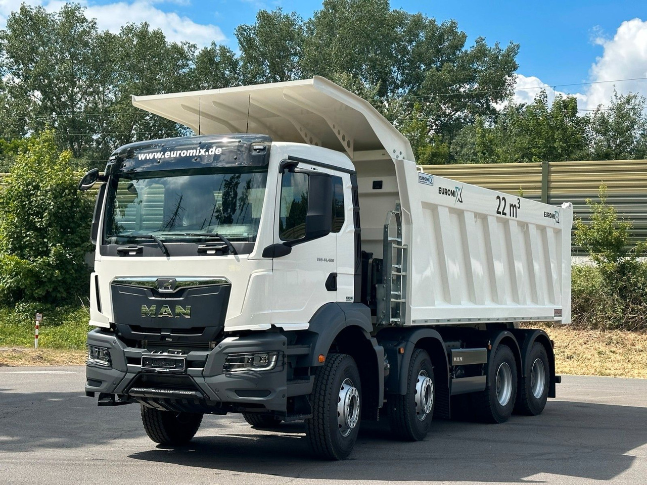 MAN TGS 41.400 8x4 / EUROMIX MTP 22m³/ Eckige Mulde - Camión volquete: foto 1 MAN TGS 41.400 8x4 / EUROMIX MTP 22m³/ Eckige Mulde - Camión volquete: foto 1
