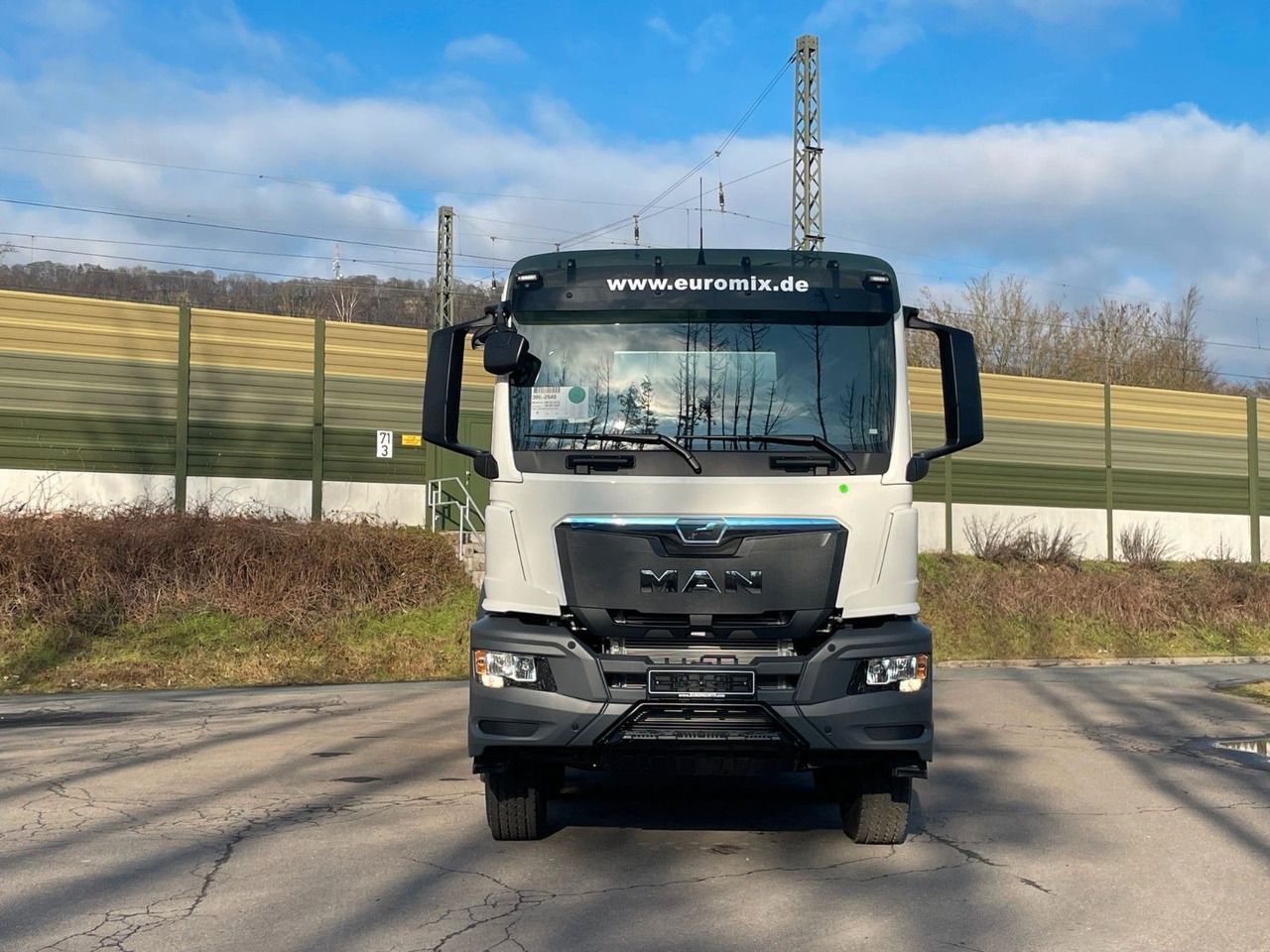 MAN TGS 41.400 8x4 / EuromixMTP EM 10m³ R / EURO 2 - Camión hormigonera: foto 2 MAN TGS 41.400 8x4 / EuromixMTP EM 10m³ R / EURO 2 - Camión hormigonera: foto 2