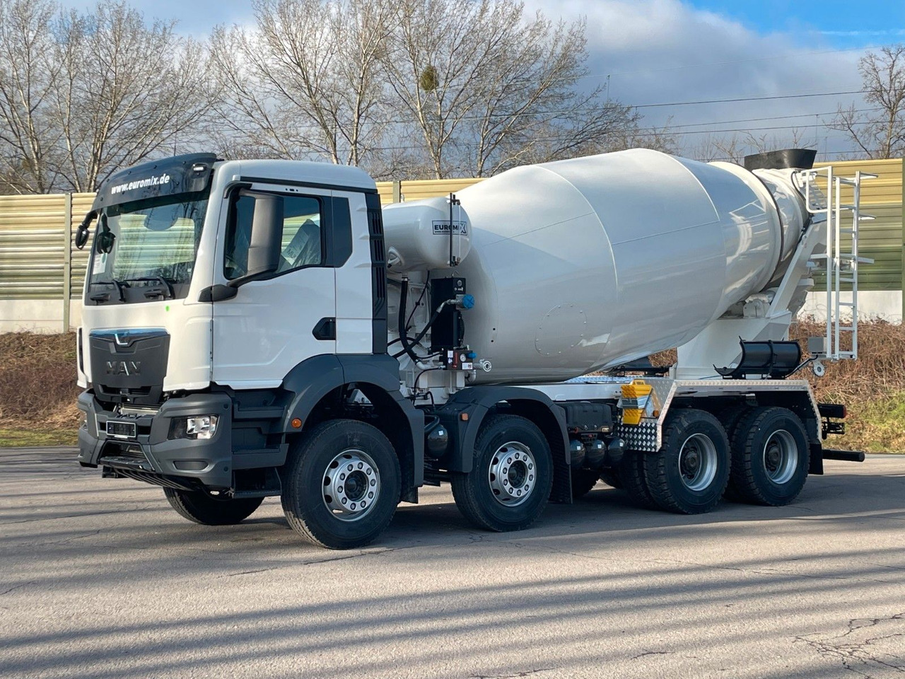 MAN TGS 41.400 8x4 / EuromixMTP EM 12m³ R / EURO 2 - Camión hormigonera: foto 3 MAN TGS 41.400 8x4 / EuromixMTP EM 12m³ R / EURO 2 - Camión hormigonera: foto 3