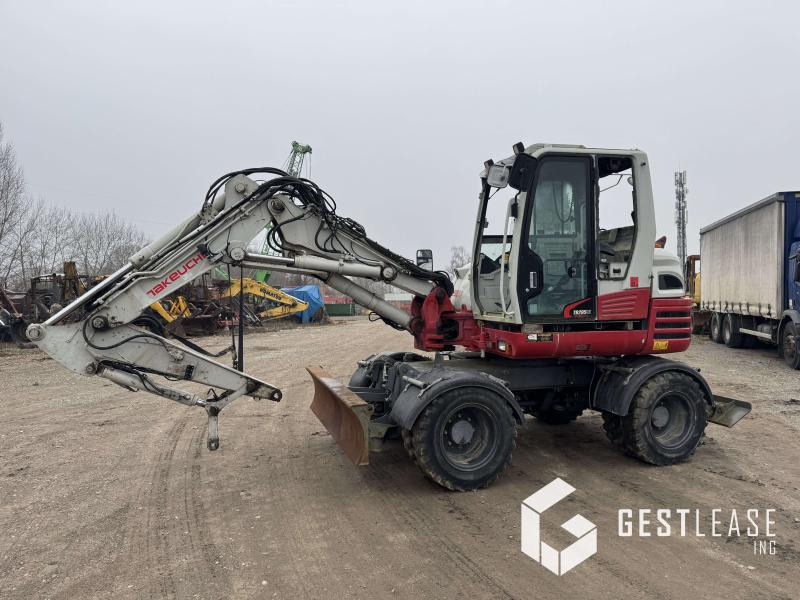 Takeuchi TB295W - Excavadora de ruedas: foto 1 Takeuchi TB295W - Excavadora de ruedas: foto 1