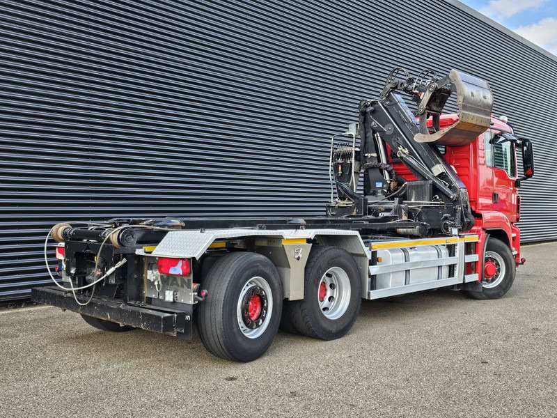 MAN TGS 26.400 / 6x4H-2 / HMF Z KRAAN + CONTAINERSYSTEM - Camión con equipo de cable, Camión grúa: foto 4 MAN TGS 26.400 / 6x4H-2 / HMF Z KRAAN + CONTAINERSYSTEM - Camión con equipo de cable, Camión grúa: foto 4