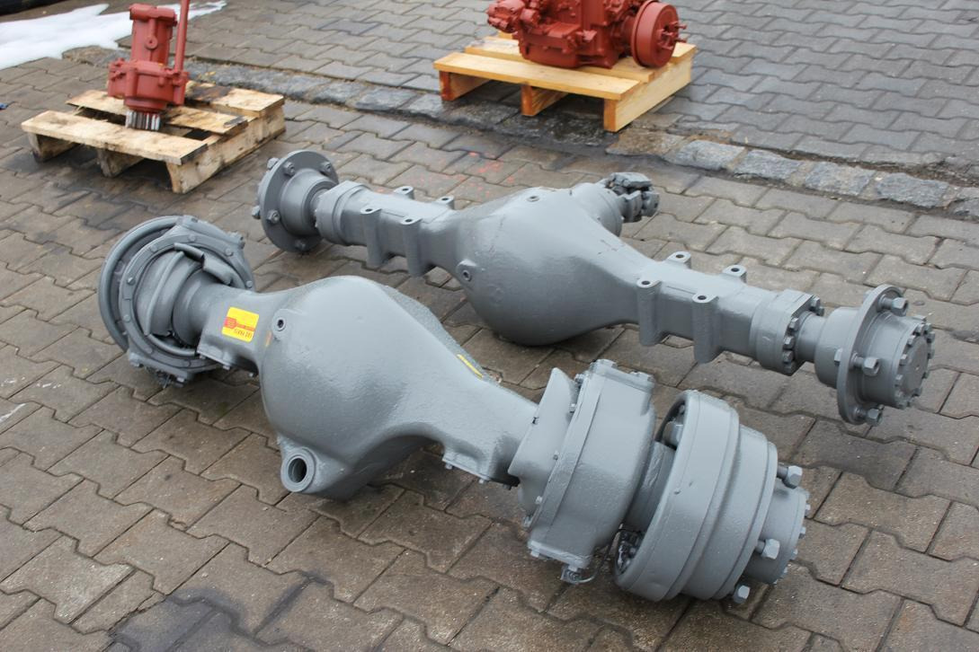 Yanmar YB 401 W - Eje y piezas para Maquinaria de construcción: foto 1 Yanmar YB 401 W - Eje y piezas para Maquinaria de construcción: foto 1
