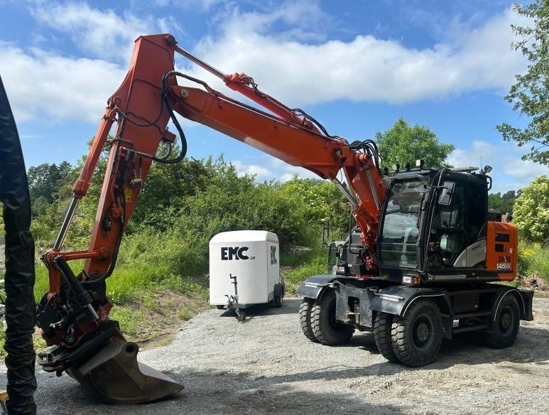 Hitachi ZX 145 W-6 - Excavadora de ruedas: foto 1 Hitachi ZX 145 W-6 - Excavadora de ruedas: foto 1
