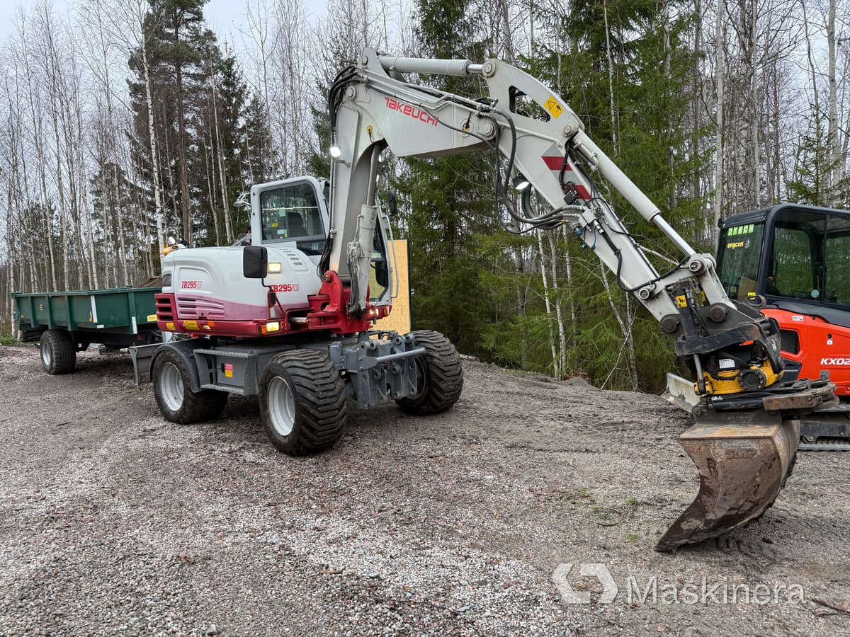 Hjulgrävare Takeuchi TB295W med vagn & redskap - Excavadora de cadenas: foto 1 Hjulgrävare Takeuchi TB295W med vagn & redskap - Excavadora de cadenas: foto 1