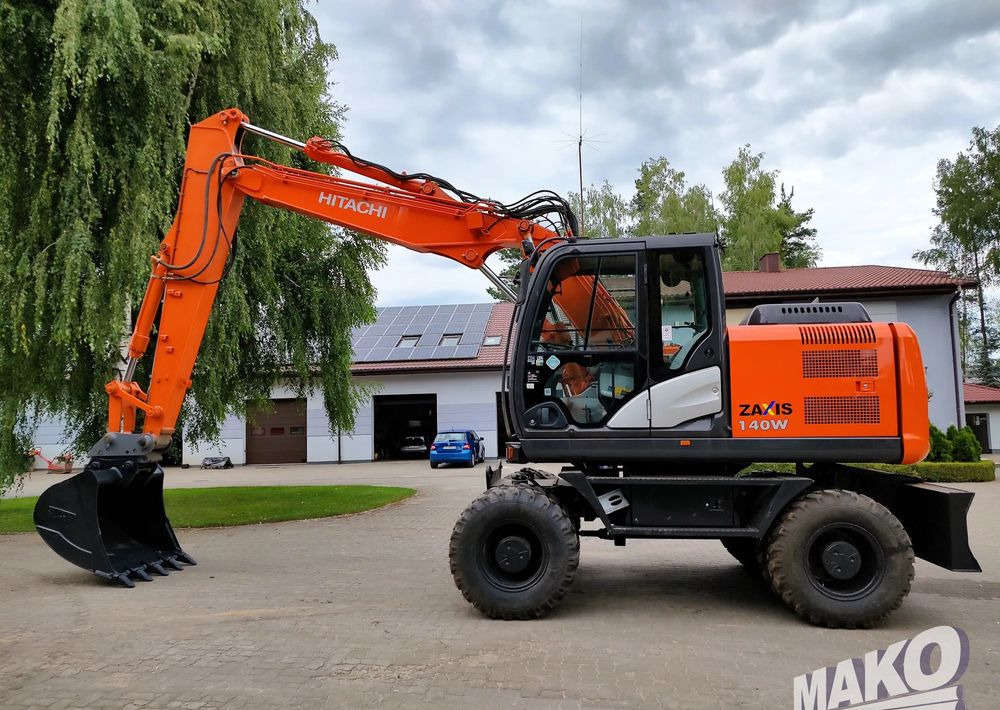 Excavadora de ruedas Hitachi ZX 140: foto 1
