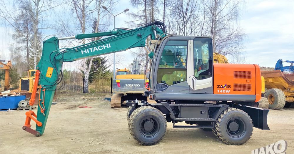 Hitachi ZX140W-3 - Excavadora de ruedas: foto 1 Hitachi ZX140W-3 - Excavadora de ruedas: foto 1