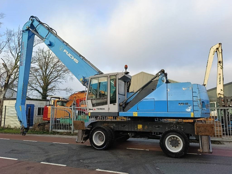 Fuchs MHL 350 industry waste handler umslagbagger - Manipulador de materiales: foto 4 Fuchs MHL 350 industry waste handler umslagbagger - Manipulador de materiales: foto 4
