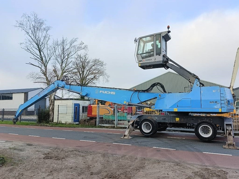 Fuchs MHL 350 industry waste handler umslagbagger - Manipulador de materiales: foto 2 Fuchs MHL 350 industry waste handler umslagbagger - Manipulador de materiales: foto 2