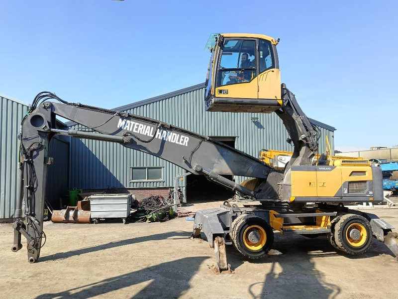 Volvo EW 210 D waste industry handler 25ton umslagbagger - Manipulador de materiales: foto 1 Volvo EW 210 D waste industry handler 25ton umslagbagger - Manipulador de materiales: foto 1
