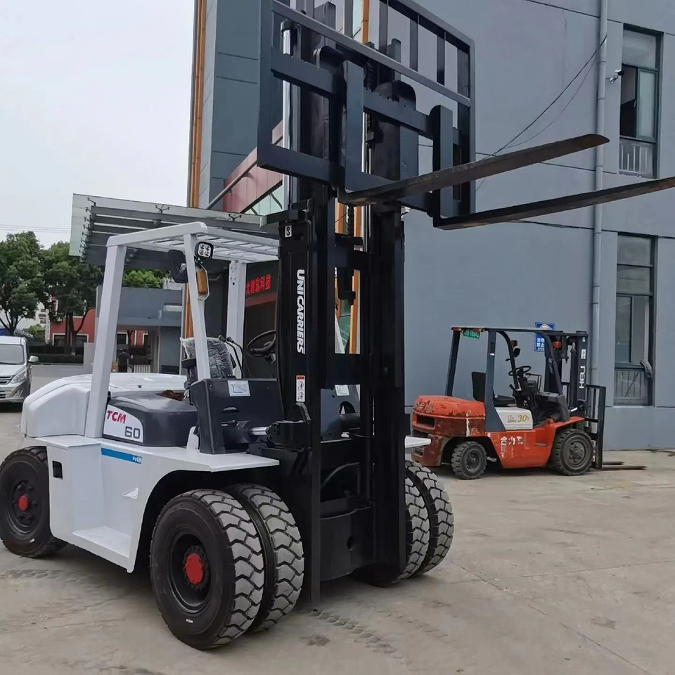 TCM 6 ton Diesel Forklift FD60 with Fork Positioner - Carretilla elevadora diésel: foto 3 TCM 6 ton Diesel Forklift FD60 with Fork Positioner - Carretilla elevadora diésel: foto 3