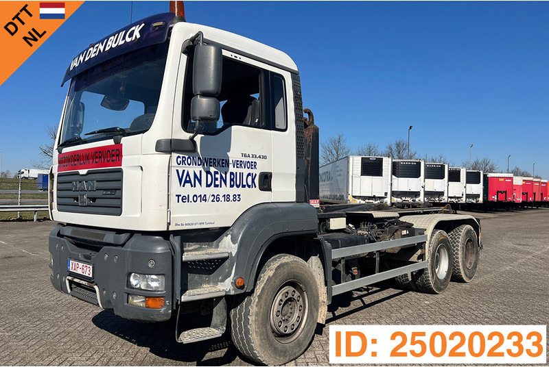 MAN TGA 33.430 - 6x4 - Camión multibasculante: foto 1 MAN TGA 33.430 - 6x4 - Camión multibasculante: foto 1